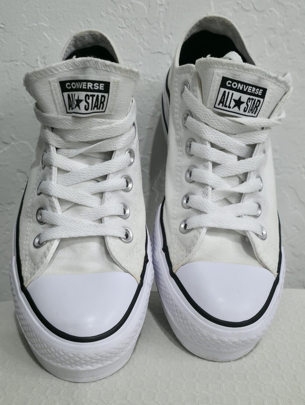 Converse White Low-Top Canvas Sneakers with Black Trim